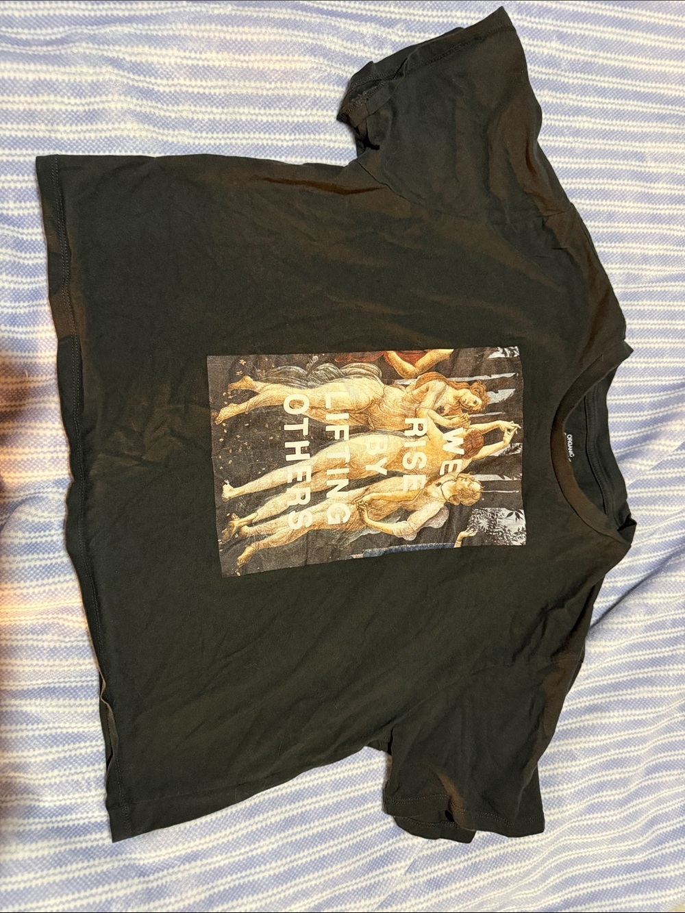 Black Graphic women’s Tee - We Rise By Lifting Others